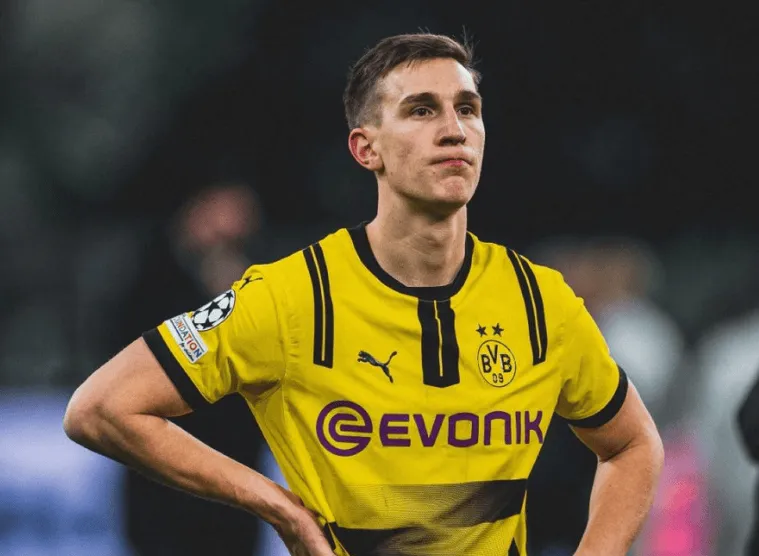 爱游戏-莫雷托：施洛特贝克向往为皇马效力，不急于与多特谈续约